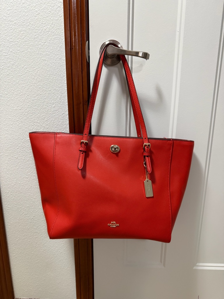 Coach Orange Leather Turn-Lock Tote With Gold Charm